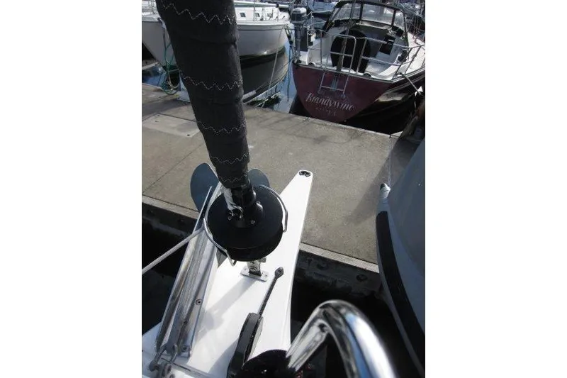 Slide: The Image of Jeanneau Sun Odyssey 349 sailboat bow at marina, 2022 model. - 40