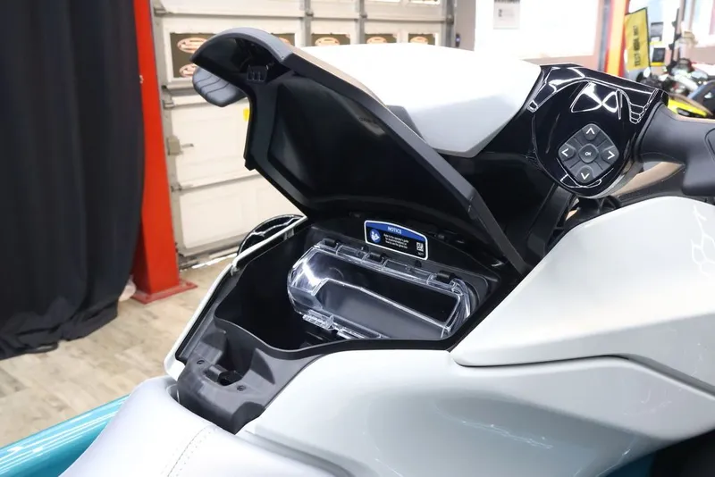Slide: The Image of 2026 Sea-Doo GTI SE 170 with open storage compartment. - 10