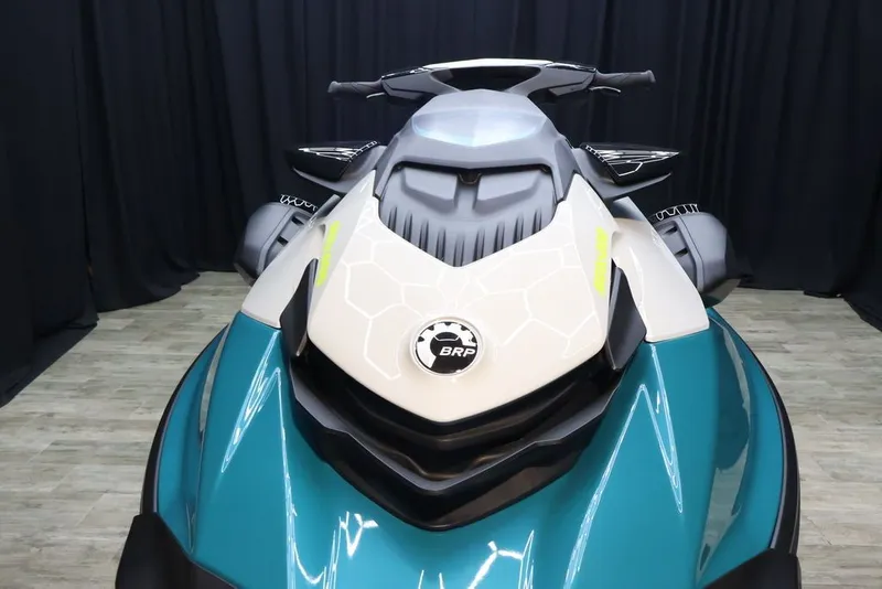 Slide: The Image of 2026 Sea-Doo GTI SE 170 jet ski, front view, blue and white design. - 12