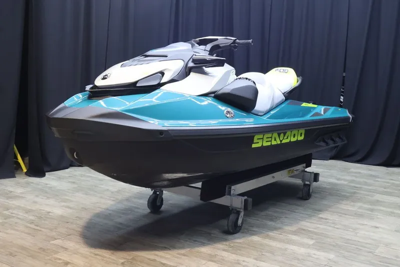 Slide: The Image of 2026 Sea-Doo GTI SE 170 jet ski on display floor. - 2