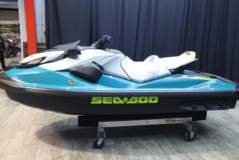 Slide: The Image of 2026 Sea-Doo GTI SE 170 jet ski in showroom. - 3