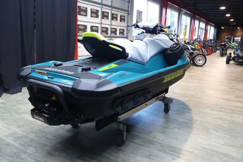 Slide: The Image of 2026 Sea-Doo GTI SE 170 jet ski in a showroom. - 6