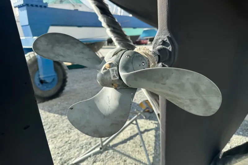 Slide: The Image of Propeller of 2000 Island Packet 380 sailboat, close-up view in a boatyard. - 6