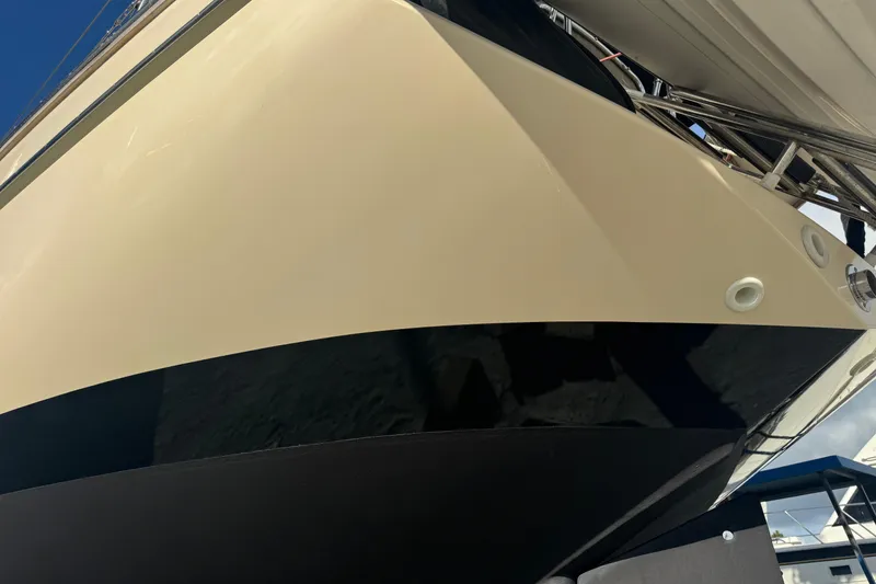 Slide: The Image of Close-up of 2000 Island Packet 380 sailboat hull, showcasing sleek design and craftsmanship. - 9