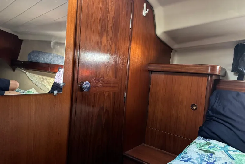 Slide: The Image of Interior cabin of 1992 Beneteau Oceanis 370 sailboat with wooden finish. - 41