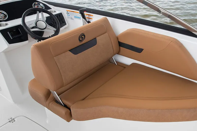 Slide: The Image of Manufacturer Provided Image: 2022 Hurricane SunDeck 235 OB boat interior with tan seating and steering wheel. - 6