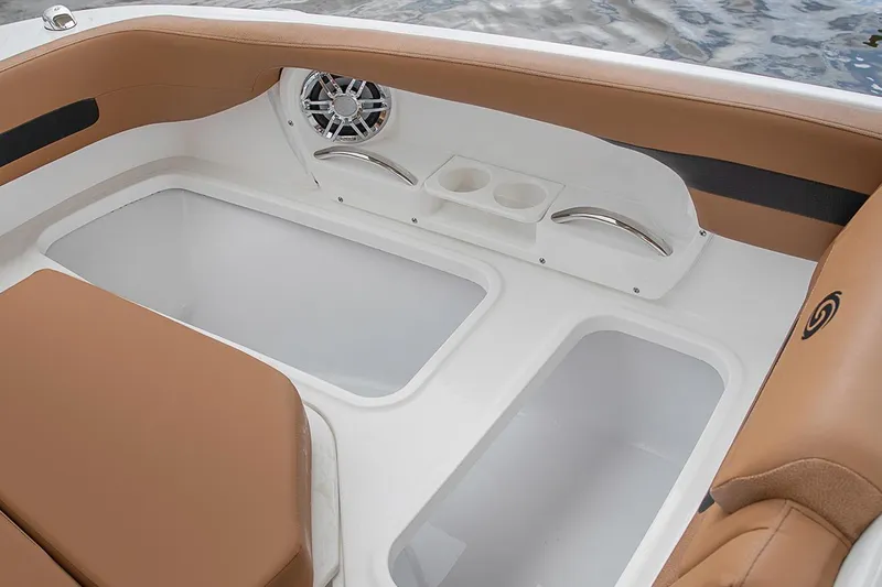 Slide: The Image of Manufacturer Provided Image: 2022 Hurricane SunDeck 235 OB boat interior with storage compartments and cup holders. - 8