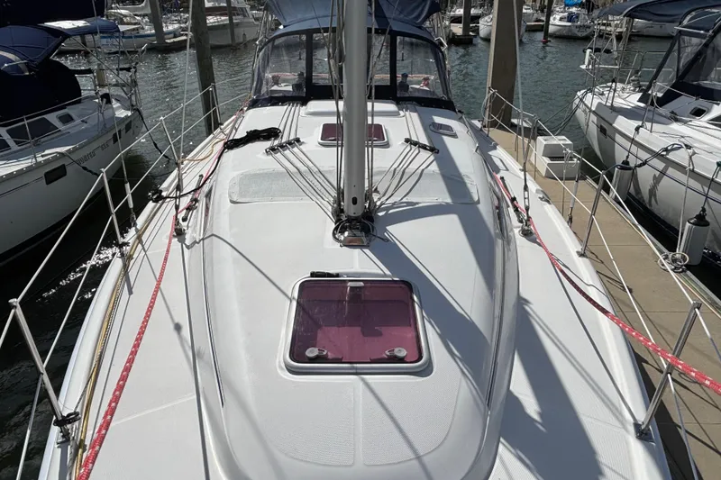 Slide: The Image of Sailboat deck view of 2006 Hunter 38 model docked at marina. - 10