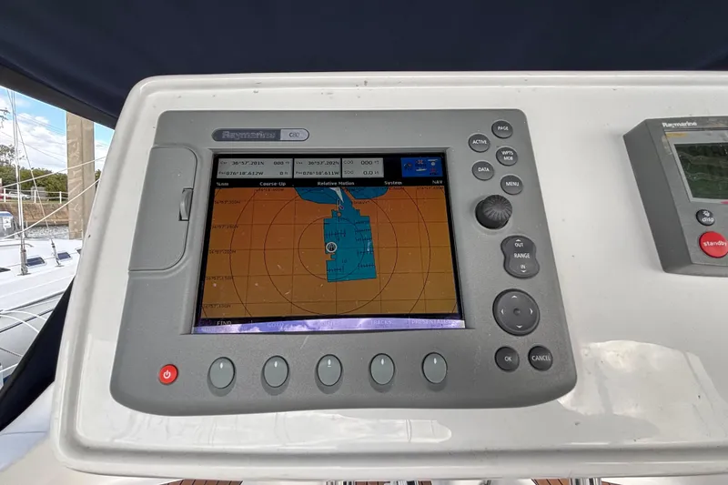 Slide: The Image of Navigation system on a 2006 Hunter 38 sailboat displaying a digital map. - 19