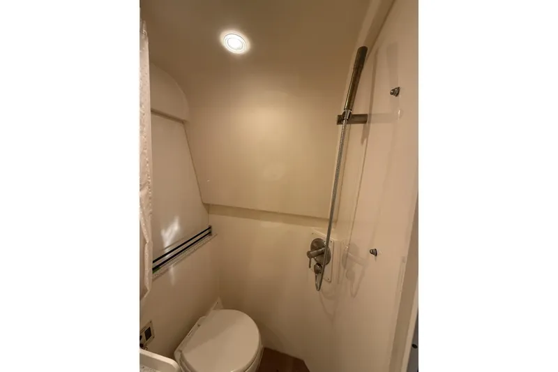 Slide: The Image of Bathroom interior of 2015 Sea Ray 370 Venture yacht with shower and toilet. - 28
