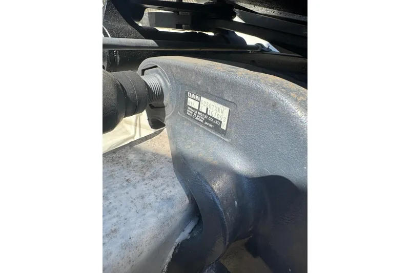 Slide: The Image of Close-up of a Yamaha engine part on a 1990 Donzi F 33 boat. - 12