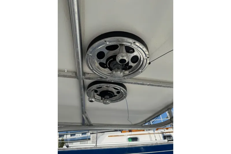 Slide: The Image of Ceiling view of a 1990 Donzi F 33 boat with metal fixtures. - 17