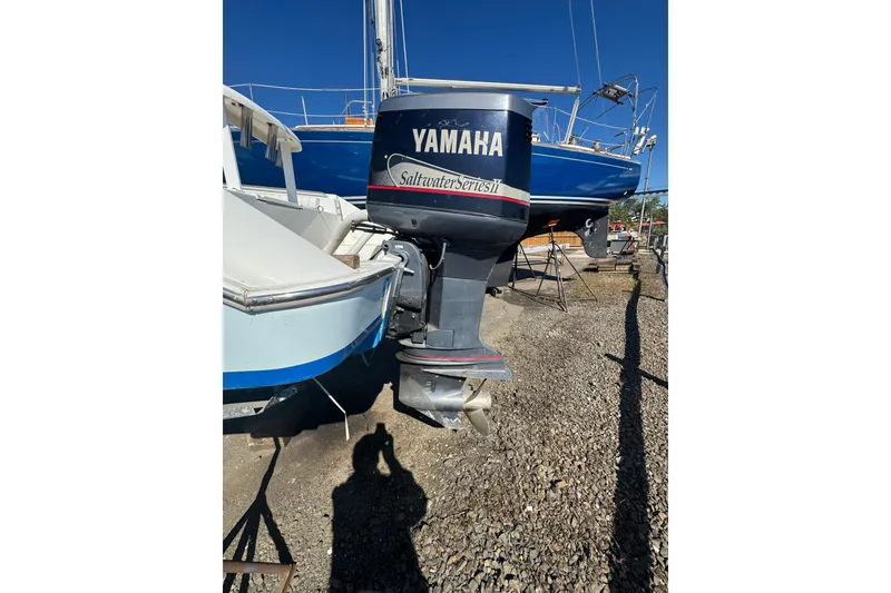 Slide: The Image of 1990 Donzi F 33 boat with Yamaha Saltwater Series II outboard motor. - 7