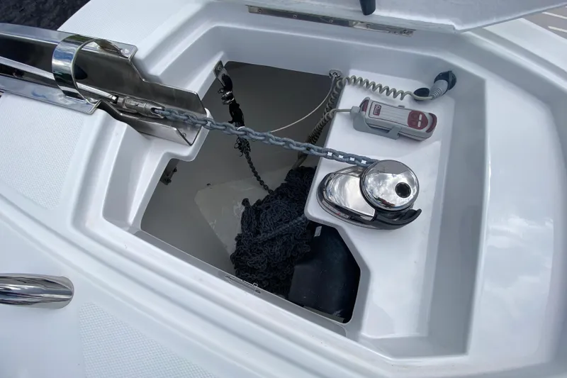 Slide: The Image of Anchor compartment of 2021 Azimut Atlantis 45 yacht with chain and winch. - 14
