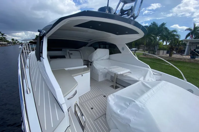 Slide: The Image of 2021 Azimut Atlantis 45 yacht with sleek deck design and luxurious seating area. - 16