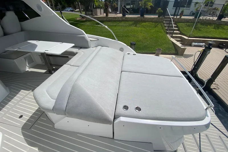 Slide: The Image of 2021 Azimut Atlantis 45 yacht with spacious sunbed and dining area. - 27