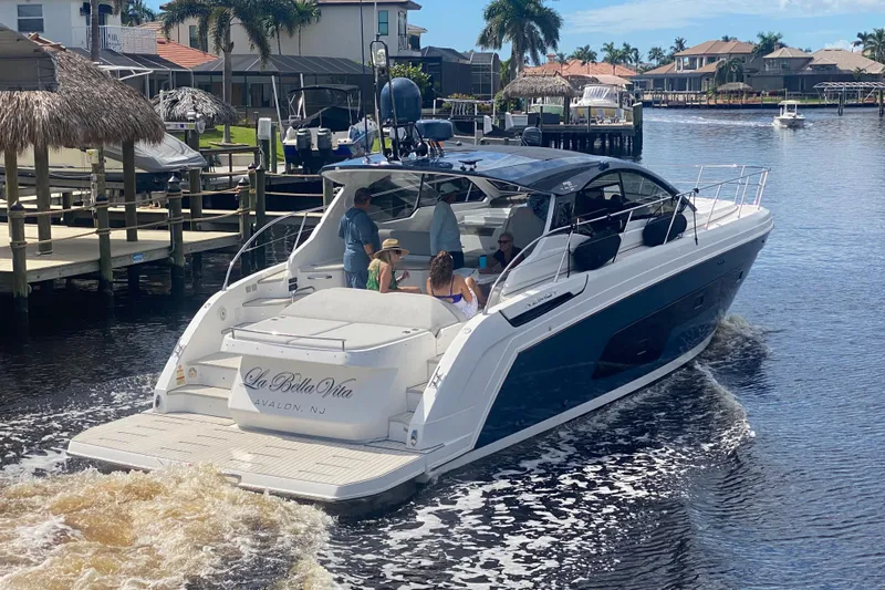 Slide: The Image of Azimut Atlantis 45 yacht cruising in a scenic waterfront area, 2021 model. - 3