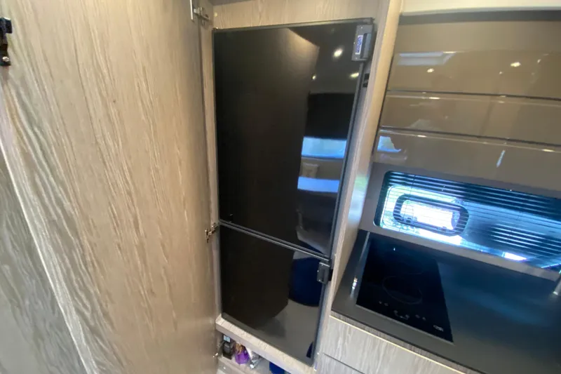 Slide: The Image of Modern kitchen interior of 2021 Azimut Atlantis 45 yacht with sleek appliances. - 42