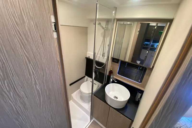 Slide: The Image of Modern bathroom in 2021 Azimut Atlantis 45 yacht with sleek fixtures and shower. - 44