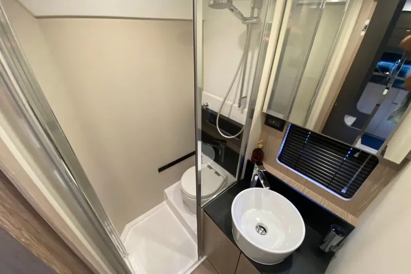 Slide: The Image of Modern bathroom in 2021 Azimut Atlantis 45 yacht with shower and sink. - 45
