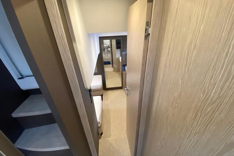 Slide: The Image of Interior of 2021 Azimut Atlantis 45 yacht, featuring modern design and cozy cabin space. - 46