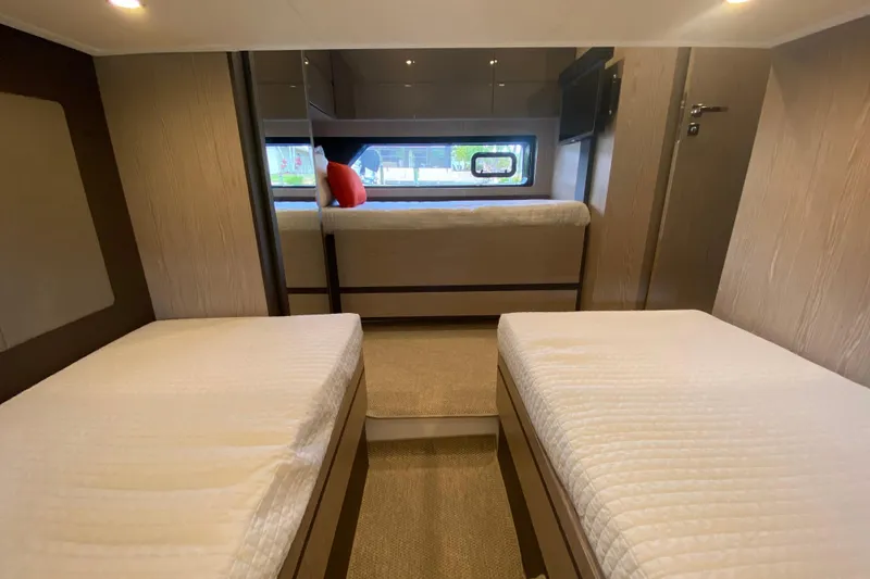 Slide: The Image of Interior of 2021 Azimut Atlantis 45 yacht with twin beds and modern design. - 50