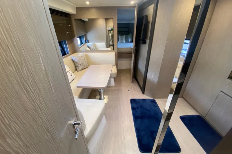 Slide: The Image of Interior of 2021 Azimut Atlantis 45 yacht, featuring modern seating and elegant design. - 52