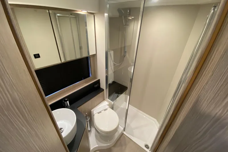Slide: The Image of Luxurious bathroom in 2021 Azimut Atlantis 45 yacht with modern fixtures and shower. - 57