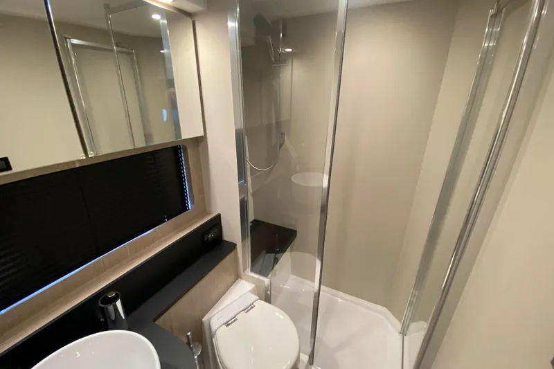 Slide: The Image of Modern bathroom interior of 2021 Azimut Atlantis 45 yacht with sleek design and glass shower. - 58