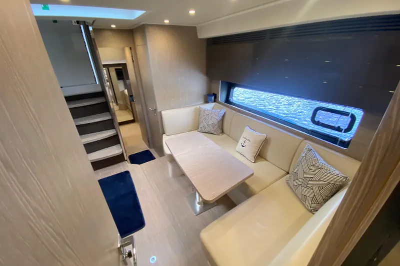 Slide: The Image of Luxurious interior of 2021 Azimut Atlantis 45 yacht with elegant seating and nautical decor. - 60