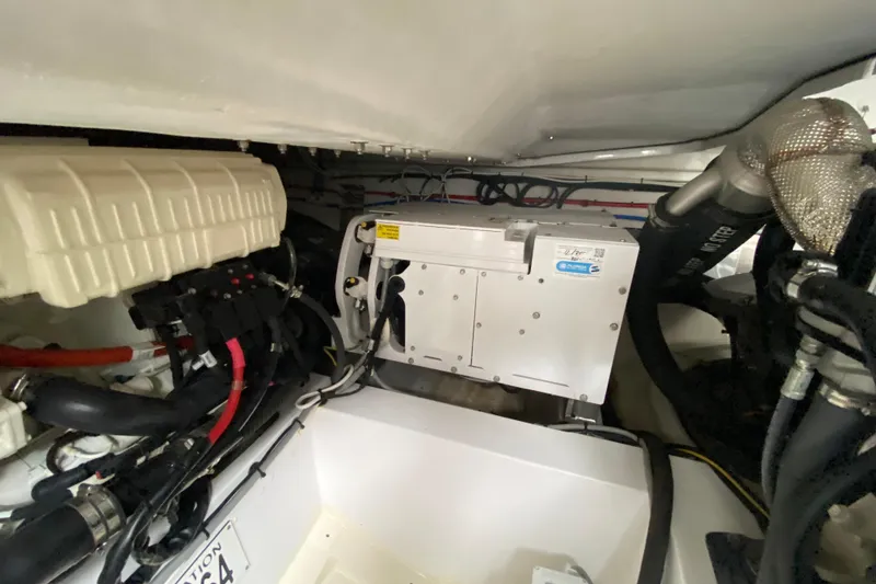 Slide: The Image of Engine room of 2021 Azimut Atlantis 45 yacht, showcasing mechanical components and systems. - 62