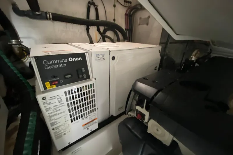 Slide: The Image of Cummins Onan generator in 2021 Azimut Atlantis 45 yacht engine room. - 63
