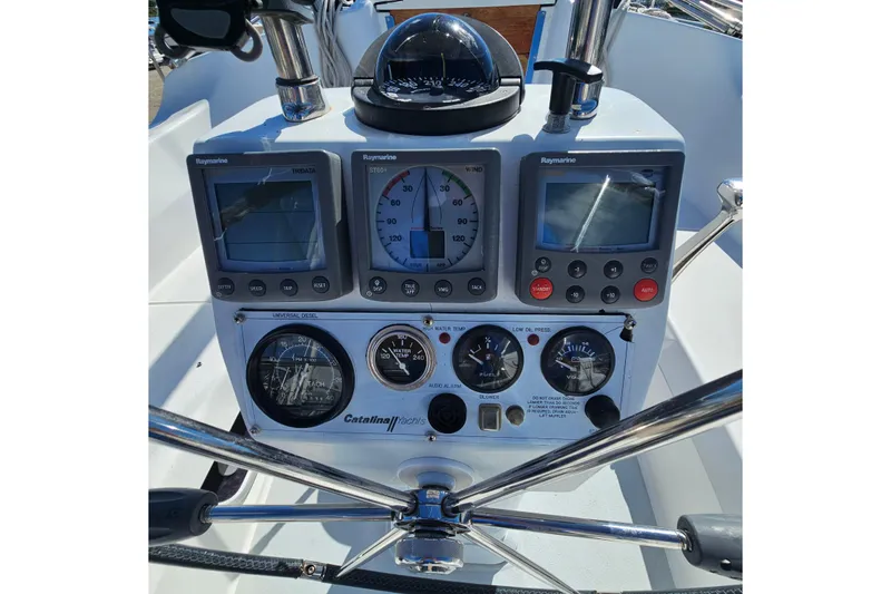 Slide: The Image of Control panel of a 2007 Catalina 350 yacht with Raymarine instruments. - 5