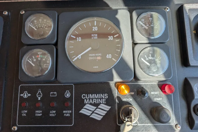 Slide: The Image of Control panel of a 2001 Dettling 51 boat with Cummins Marine engine gauges. - 20