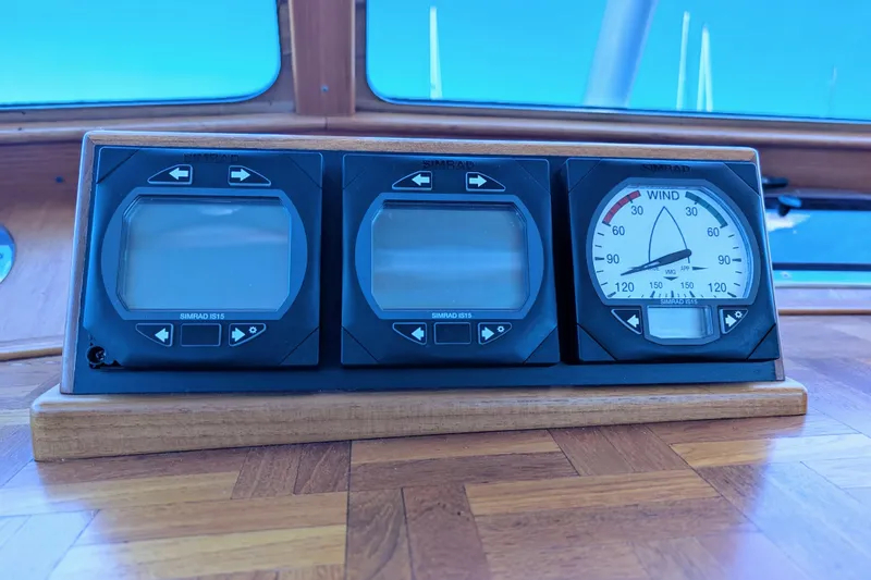 Slide: The Image of Simrad IS15 marine instruments on a Dettling 51 yacht dashboard, 2001 model. - 22