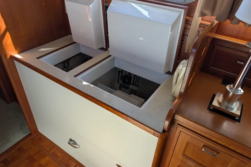 Slide: The Image of Open storage compartments in a 2001 Dettling 51 yacht interior. - 28