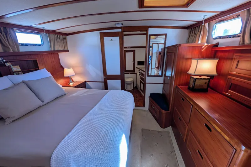 Slide: The Image of Luxurious cabin interior of 2001 Dettling 51 yacht with elegant wood furnishings. - 42