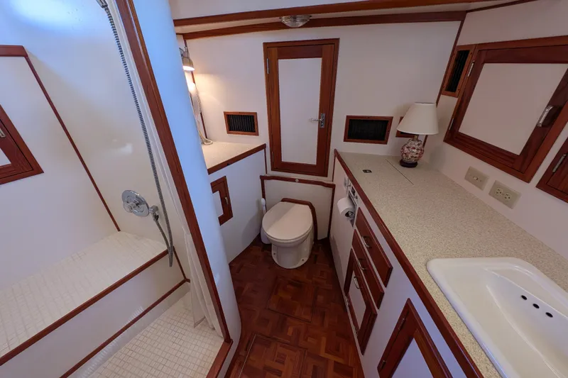 Slide: The Image of Luxurious 2001 Dettling 51 yacht bathroom with wood accents and modern amenities. - 45