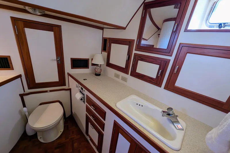 Slide: The Image of Luxurious Dettling 51 yacht bathroom, 2001 model, featuring wood accents and modern fixtures. - 46