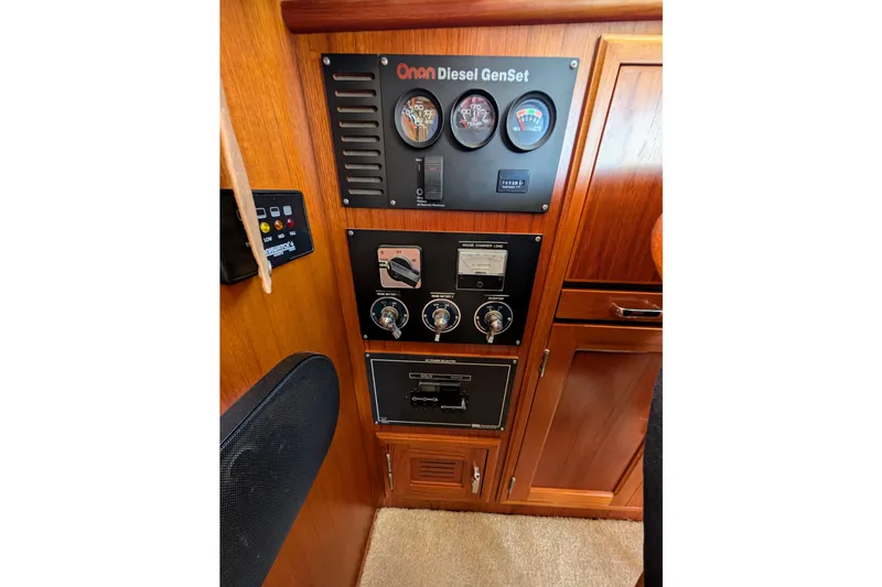 Slide: The Image of Control panel of a 2001 Dettling 51 yacht with Onan Diesel GenSet. - 48