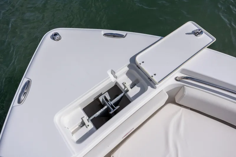Slide: The Image of 2020 Sea Hunt Ultra 225 boat anchor compartment detail. - 11