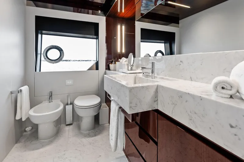 Slide: The Image of Luxurious bedroom interior on 2023 Riva 110' Dolcevita yacht with modern design and elegant decor. - 43