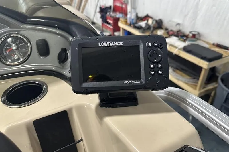 Slide: The Image of Lowrance fish finder on 2019 Sun Tracker Party Barge 22 RF DLX dashboard. - 12