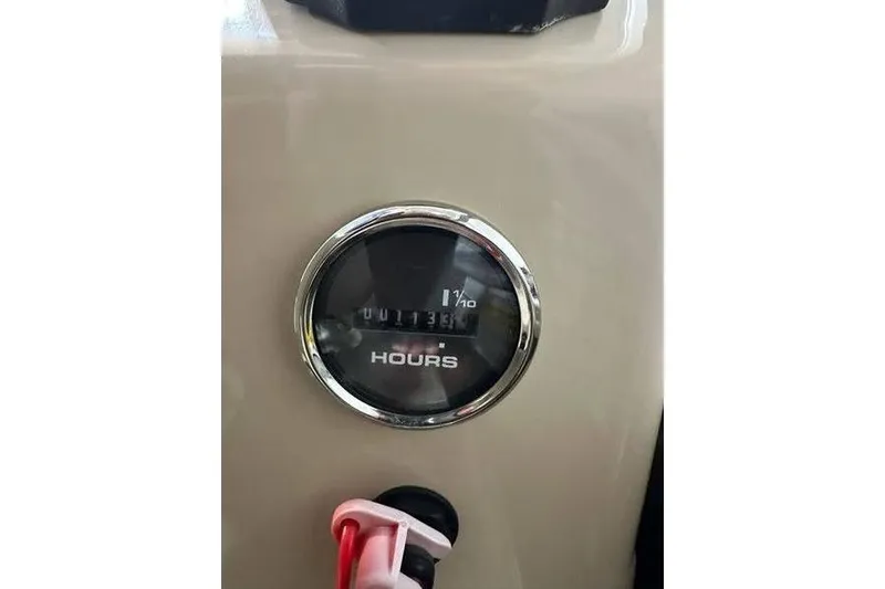 Slide: The Image of Hour meter on 2019 Sun Tracker Party Barge 22 RF DLX showing 113.6 hours. - 14