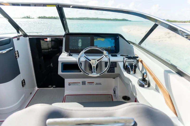 Slide: The Image of 2026 Regal LX9 boat interior with sleek seating and modern design. - 11