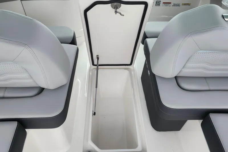 Slide: The Image of 2026 Regal LX9 boat interior with sleek gray seating and modern design elements. - 31
