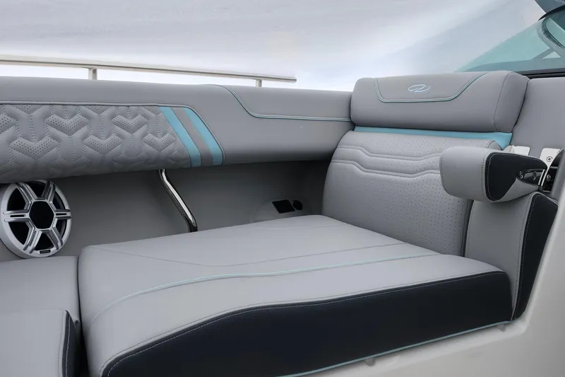 Slide: The Image of 2026 Regal LX9 storage compartment with wood accents and sleek design. - 34