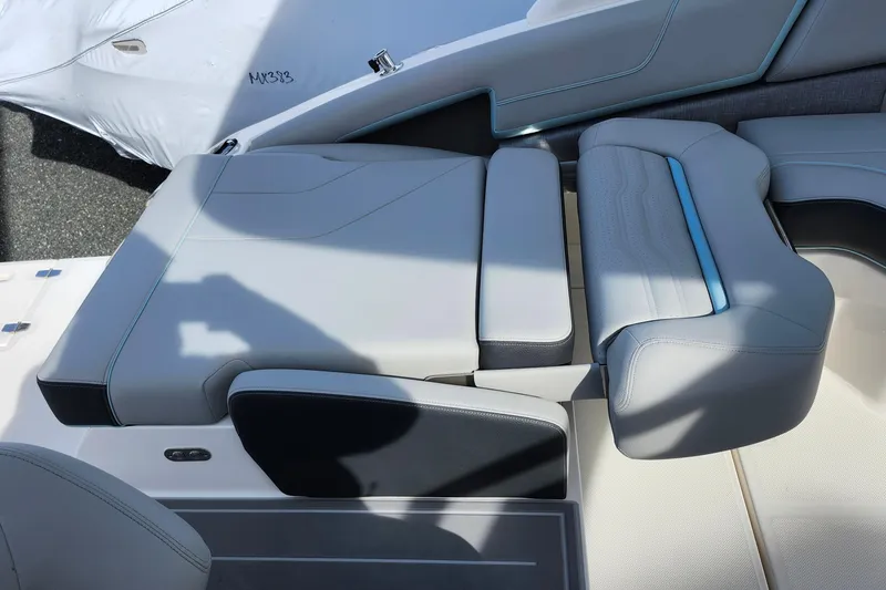 Slide: The Image of 2026 Regal LX9 boat interior with modern seating and sleek design. - 40