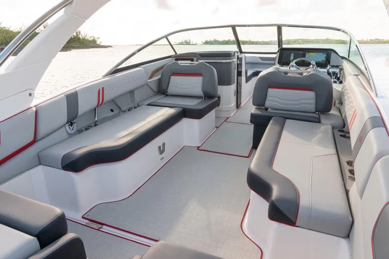 Slide: The Image of Luxurious seating in 2026 Regal LX9 boat, featuring sleek gray upholstery and modern design. - 9