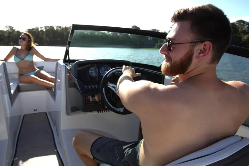 Slide: The Image of 2019 Monterey M-205 boat with Mercury engine, parked outdoors. - 3